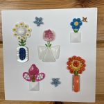 FIVE PRETTY FLOWER POTS